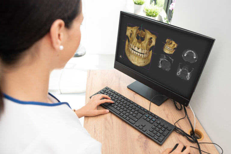 Dental 3D tomography, female dentist at office